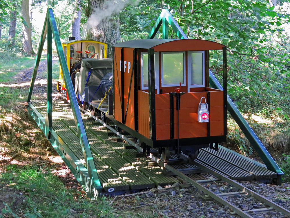 The Feldbahn and it's train on one of the Wherwell bridges